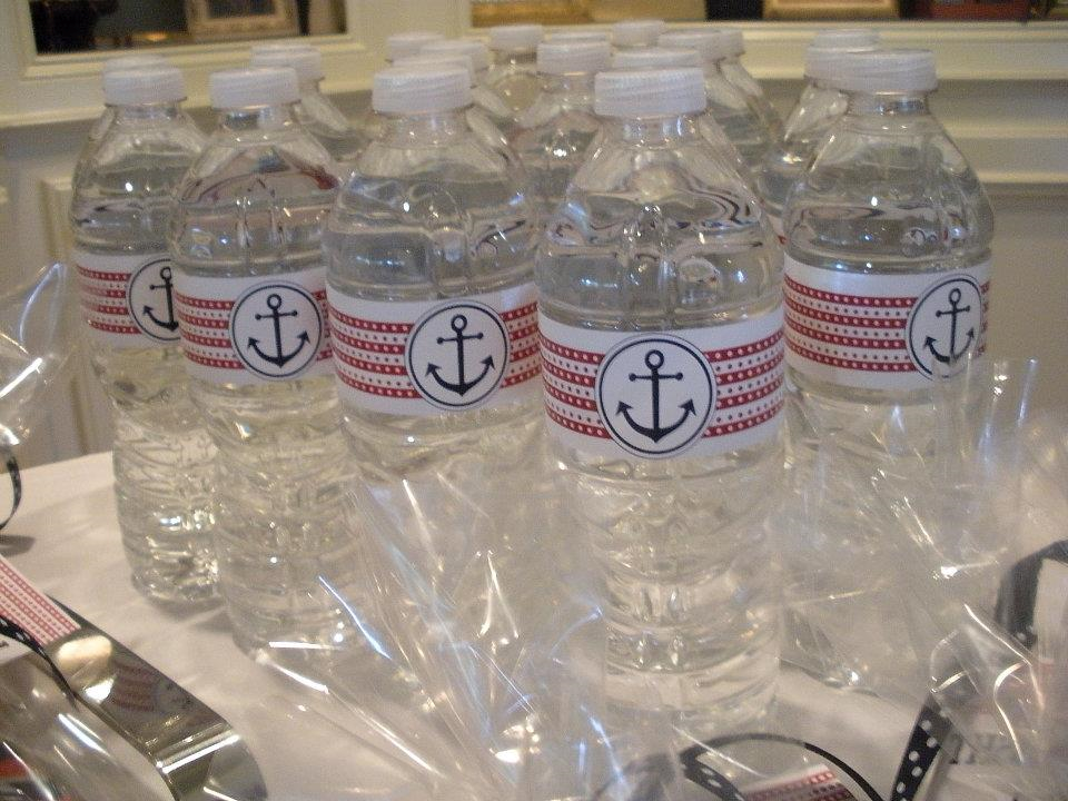 Water bottles each with an anchor on the label. 