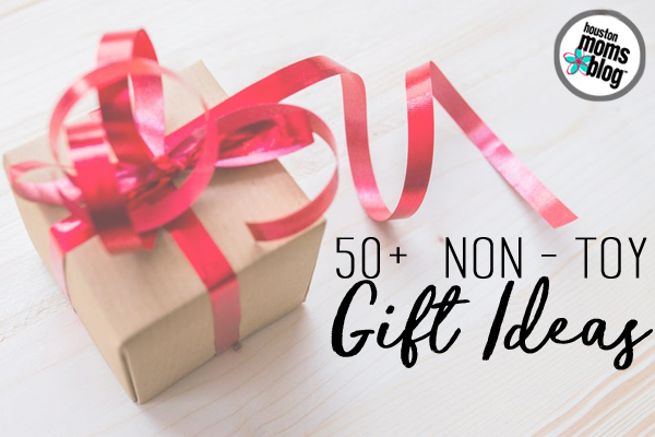 50 plus non toy gift ideas. A photograph of a wrapped present. Logo: Houston Moms Blog. 