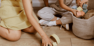 8 Mom Hacks for a Tidy Home mom and child tidy home by cleaning up blocks