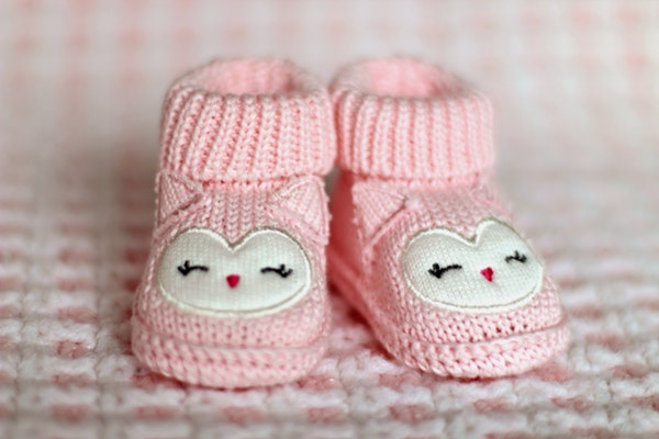 A pair of baby shoes. 