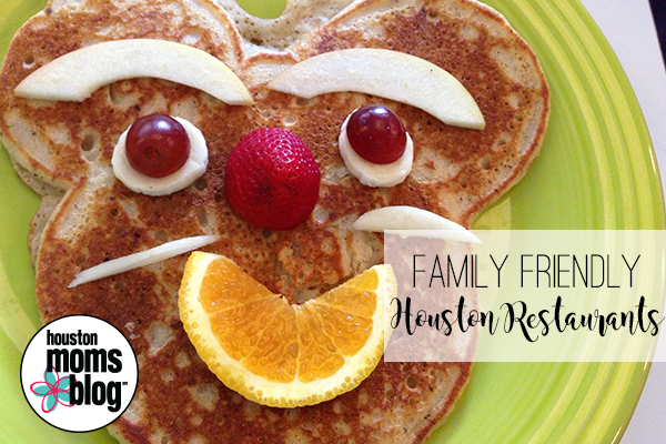 Family Friendly Houston Restaurants. Logo: Houston moms blog. A photograph of a pancake with facial features created from fruit. 