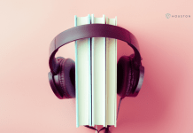 Why Audiobooks Should Be On Your Family’s Summer Reading List Headphones around stack of books