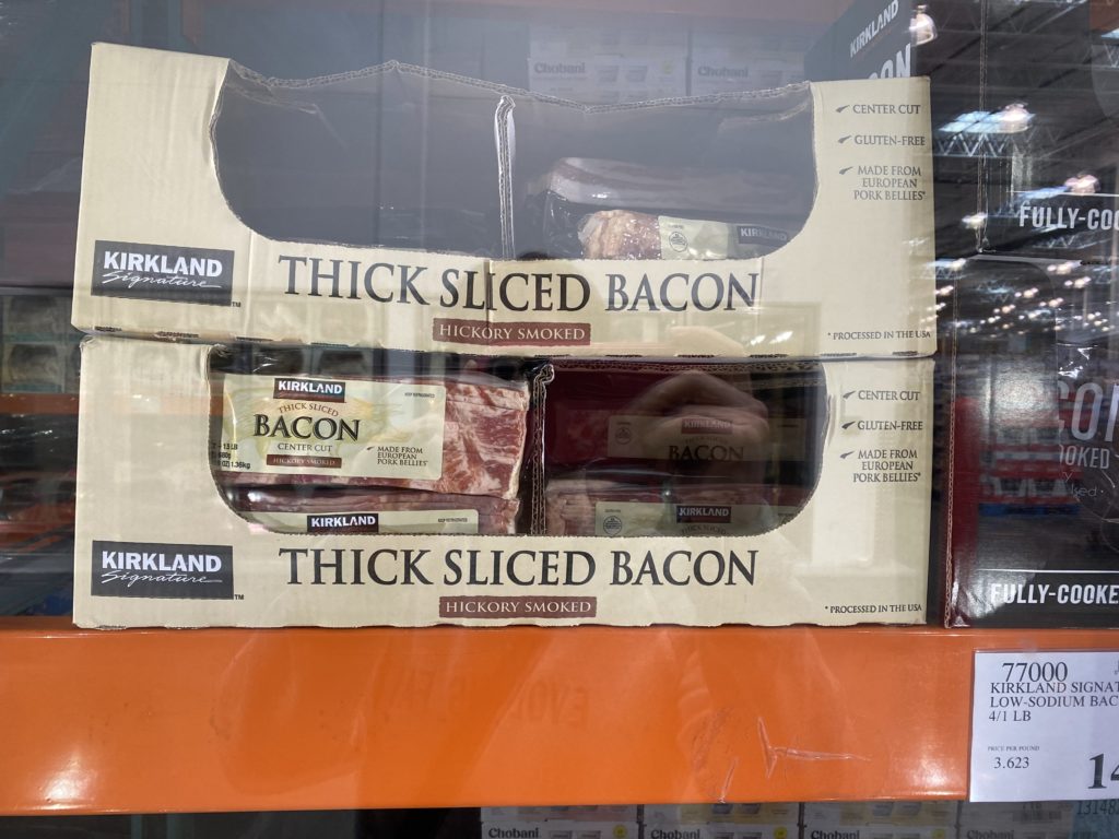 Packages of Thick sliced bacon. 