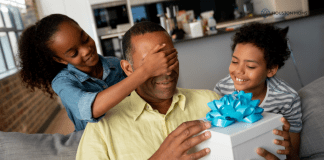 A Father’s Day Gift Guide for Houston Dads children surprising dad with father's day gift