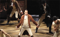 A GIF of a group of actors from Hamilton dancing. 