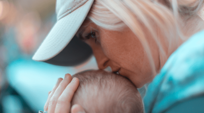 Foster Faux Pas:: What Not to Say A woman kisses a baby's head.