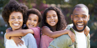 Where to Celebrate Juneteenth in Houston family with arms around each other