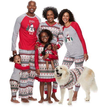 Family of 5 and their dog in matching family pajamas