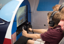 kids on flight simulator