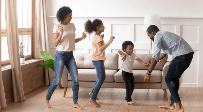 I Have Plenty of Time: Sharing My Love of Music with My Kids family of four dancing in living room