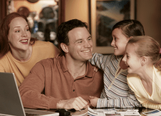 family planning a vacation is all smiles around the table