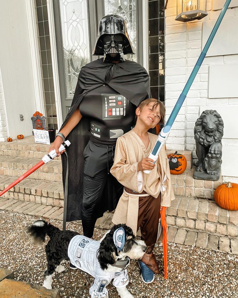 dad, son and dog dressed as Star Wars characters