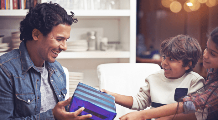 kids giving dad gift