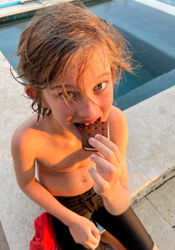 boy eating ice cream bar