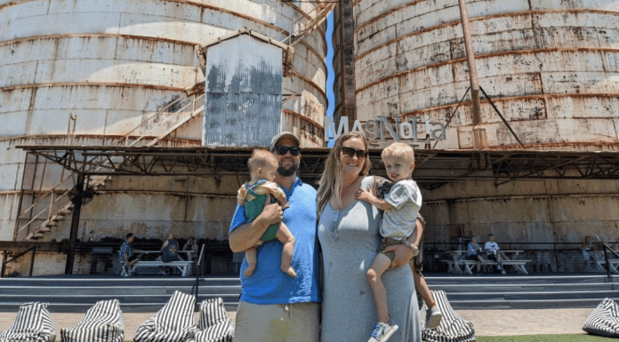 The Best Things to Do in Waco with Kids family of four in front of Waco silos