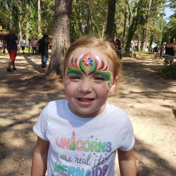young girl with face painted
