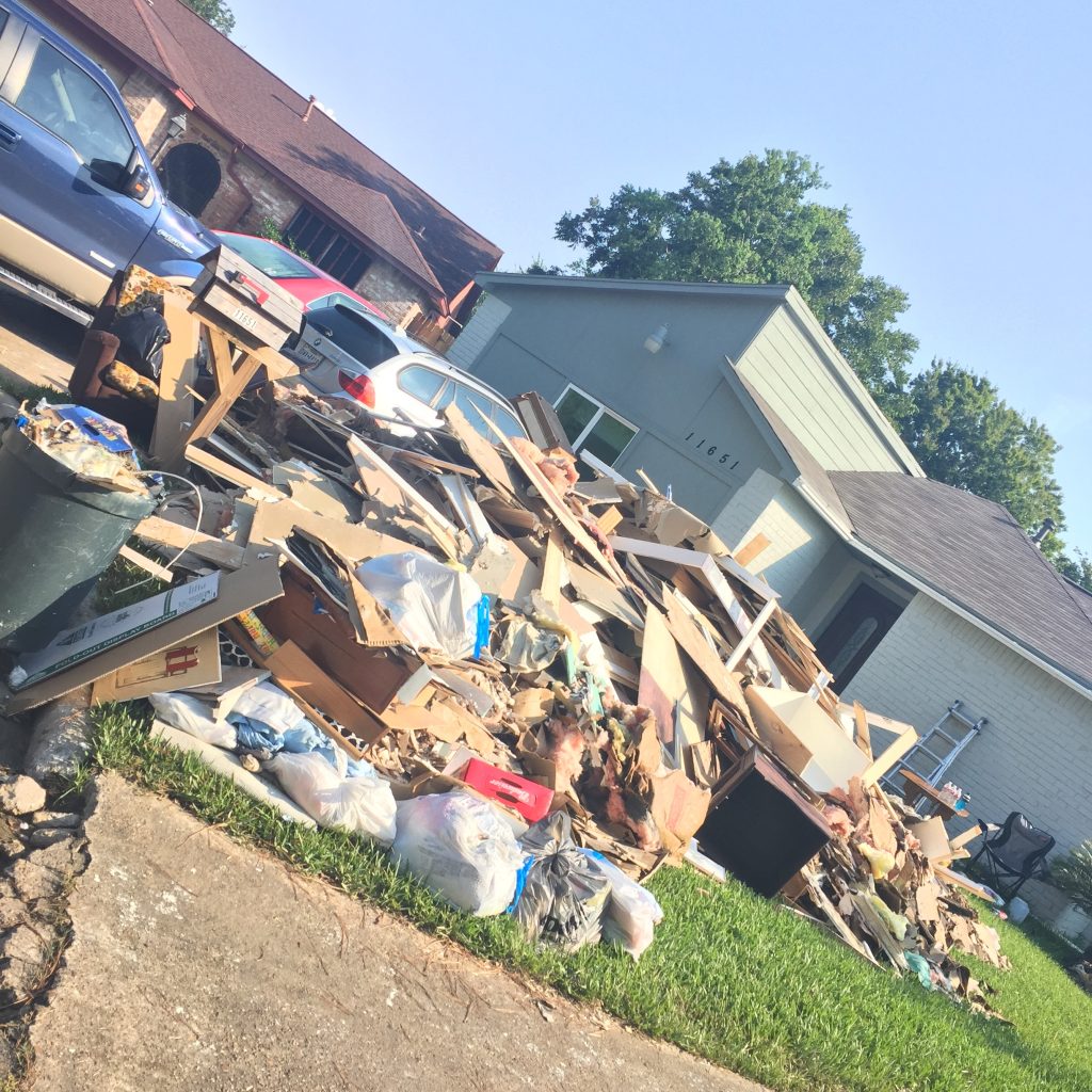 contents of flooded house on yard