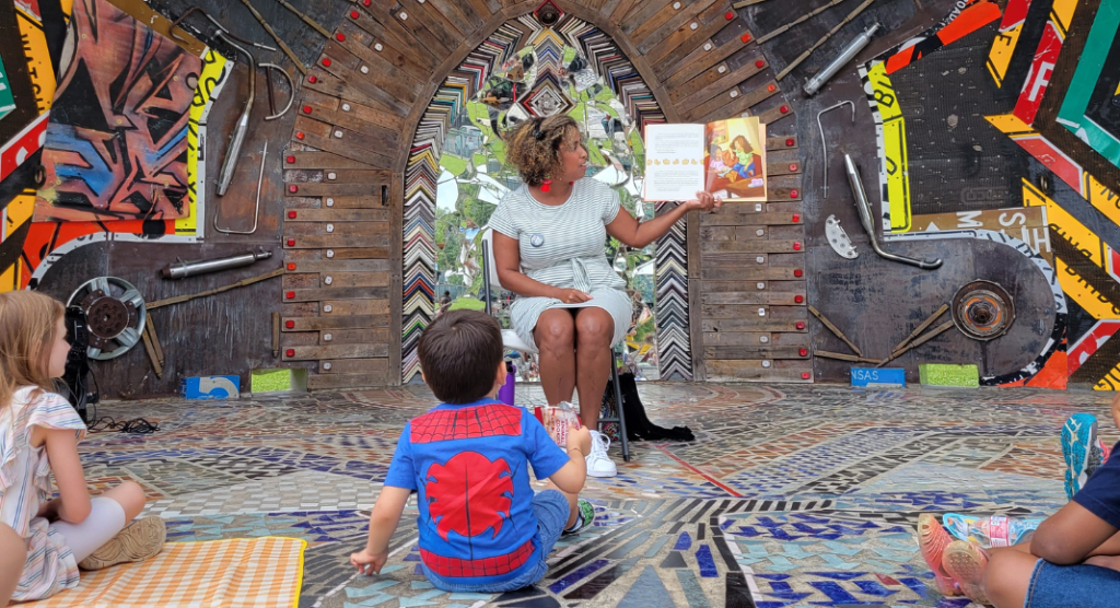 woman reading to children 