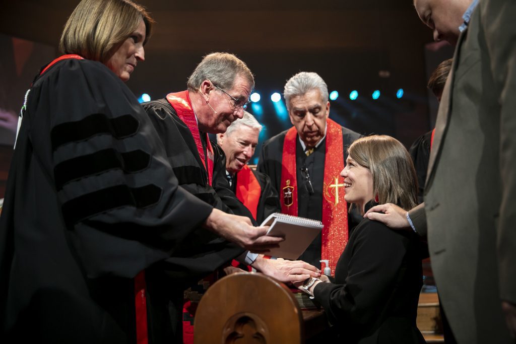 woman becoming ordained minister