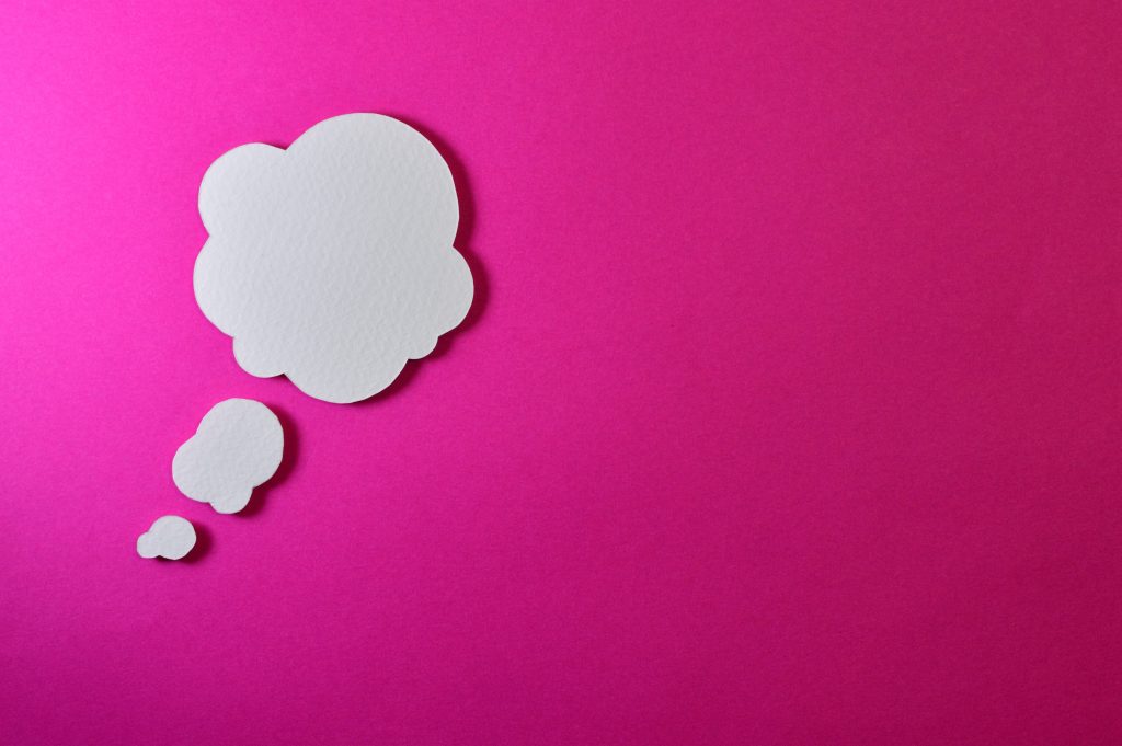 thought bubble cloud on a pink background
