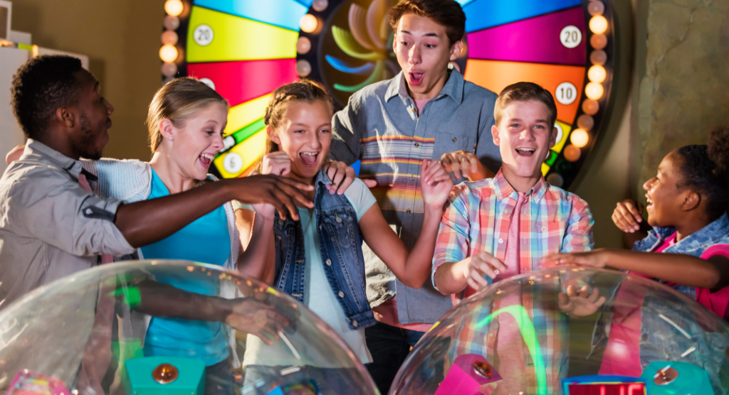 group of kids having fun at an arcade
