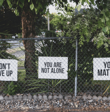 signs showing positive messages about mental health