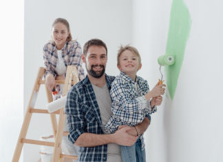 family painting a room