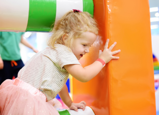 child on indoor play structure