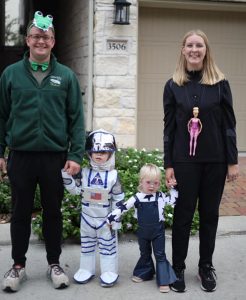 A family dressed as Elton John and his songs for Halloween