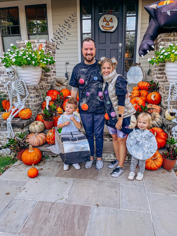 A family dressed in a space theme for Halloween
