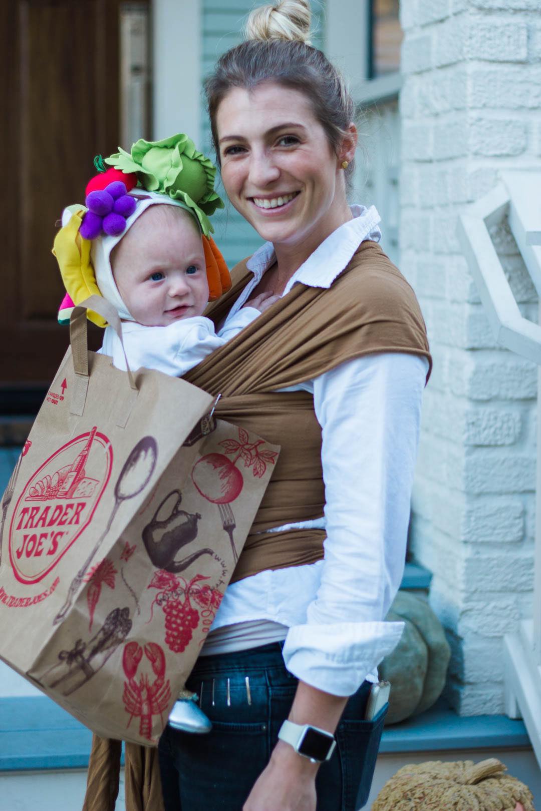 A baby dressed as Trader Joe's produce