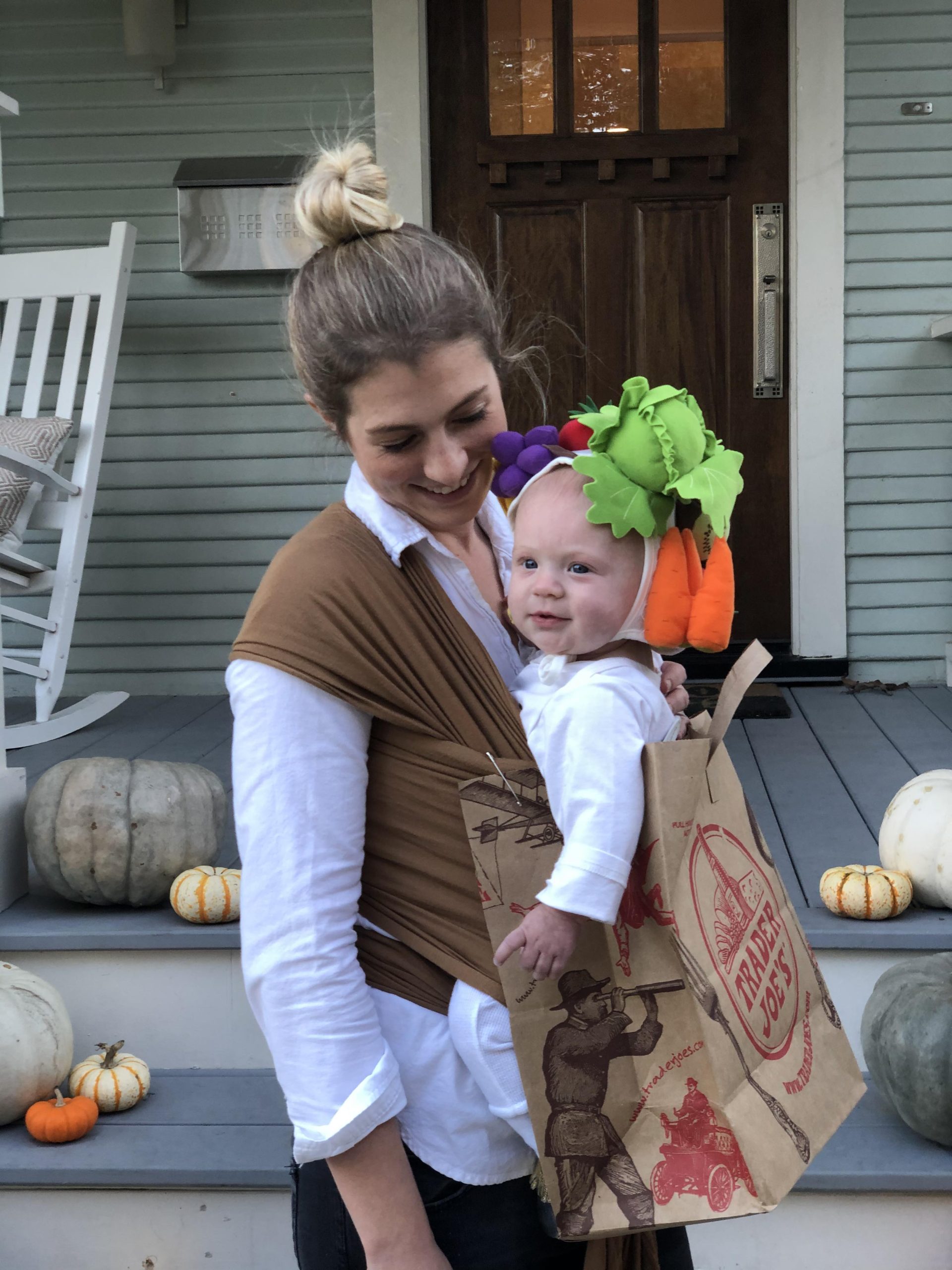 A baby dressed as a Trader Joe's paper bag for Halloween