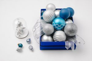 box of blue and silver ornaments