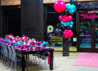 Birthday party set up with decorated table and balloons