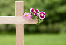 wooden cross with flowers