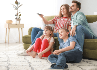family watches streaming services on television