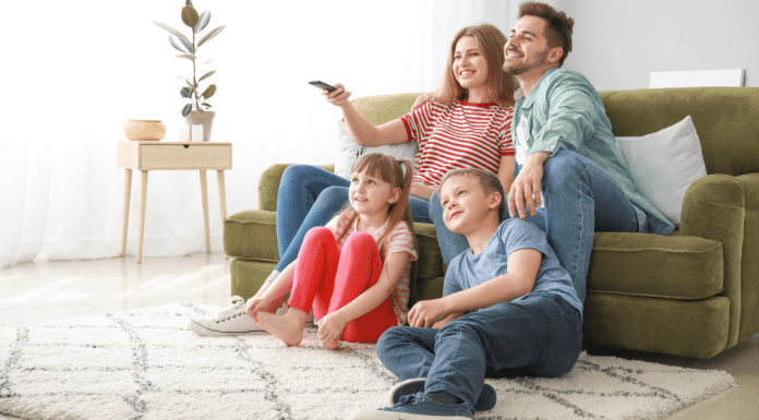 family watches streaming services on television
