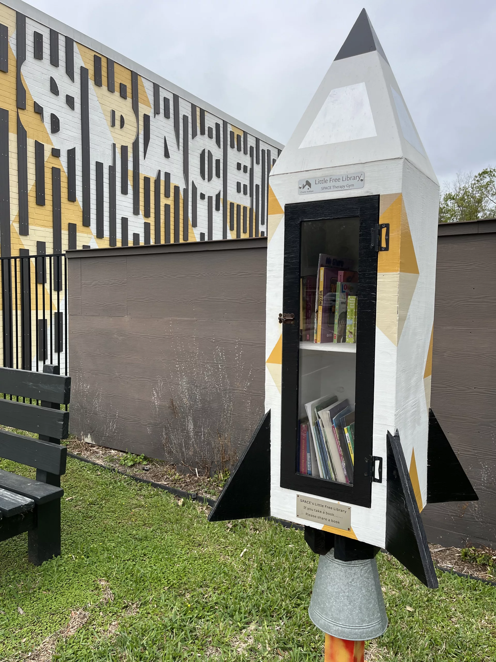 space shuttle shaped little free library