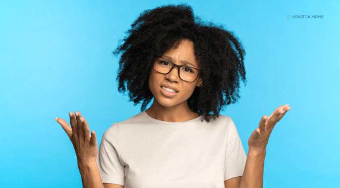 confused woman with hands up
