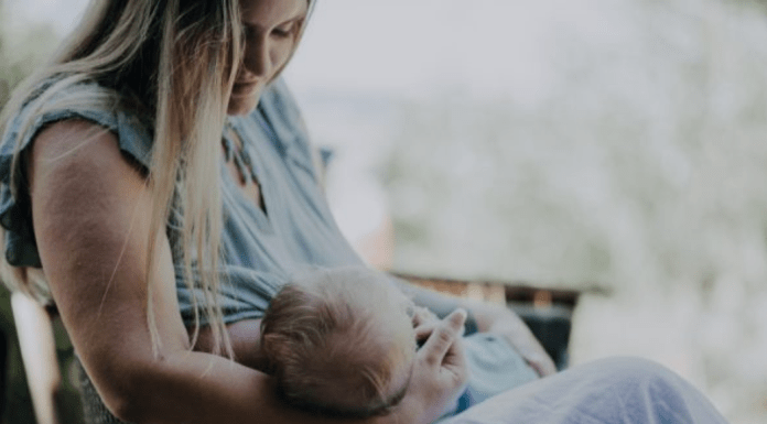 woman breastfeeding infant