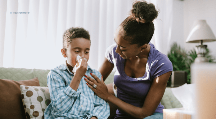 Is It Allergies Or a Cold? Tips for Knowing the Difference child sitting with mother sniffling