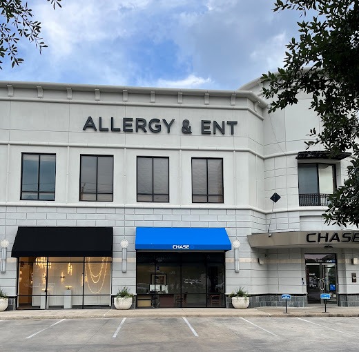 a building with the words allergy & ent