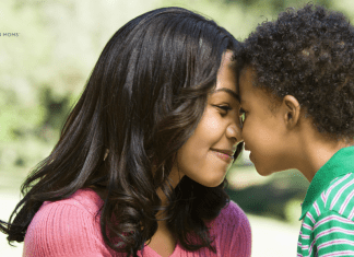 The Consequences of Pregnancy: Emotional Damage mother and son with foreheads together, smiling