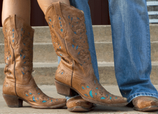 Houston Rodeo Fashion: A Stylish Mama’s Guide man and woman's legs with rodeo boots on