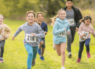 kids running in field on a fun run