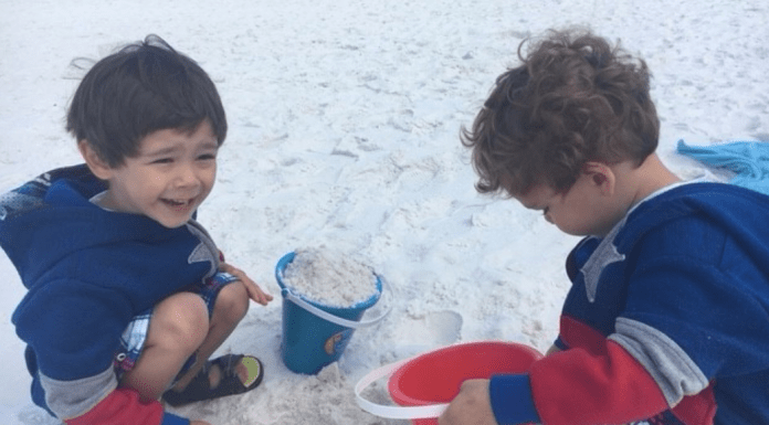 How Your Child May Benefit from Occupational Therapy two preschool aged boys playing in the sand
