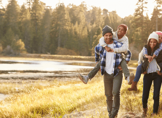 Raising Kids to Appreciate Nature: Spring Activities for Young Explorers family hiking outside