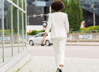 The Power to Believe: Letting Go woman walking outside a building