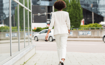 woman walking outside a building