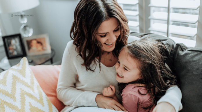Motherhood Musings from Real Moms Mother cuddling with daughter